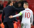 Football friendlies: Rooney says farewell; Croatia stun Spain