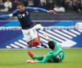 Football friendlies: France win but Mbappe injured