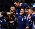 Nations League: Forrest treble earns Scotland promotion, Serbia also through