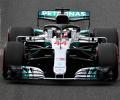 Hamilton storms to 80th pole in Japan, Vettel ninth