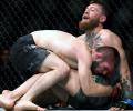 Brawls overshadow Khabib's UFC title win over McGregor