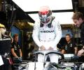 Hamilton fastest overall on damp day in Hungary