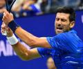 US Open PICS: Djokovic, Federer through; Venus exits