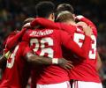 PHOTOS: Manchester United thrash AZ, Arsenal held