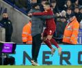 EPL PHOTOS: Reds continue march towards title; United down Newcastle