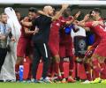 Qatar reach Asian Cup final despite sandal-throwing UAE fans