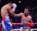 Sports Shorts: Pacquiao beats Thurman to win WBA crown