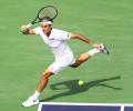 Tennis PIX: Federer, Nadal win openers; Serena retires