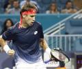 Ferrer stuns Zverev, Federer fights back; Osaka knocked out