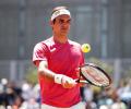 No lofty expectations for Federer on clay court return