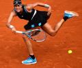 French Open PIX: Muguruza powers past Svitolina; Pliskova shocked