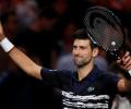 Impressive Djokovic beats Dimitrov as Nadal pulls out