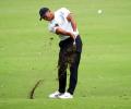 Woods takes two-shot lead at rain-hit Zozo Championship