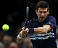 Djokovic sees off Edmund; Barty in WTA Finals last four