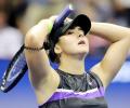 PICS: Andreescu sees off Mertens to make US Open semis