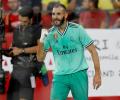 Soccer PIX: Benzema header beats Sevilla; Napoli thrash Lecce