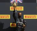 F1 PIX: Hamilton wins British GP with punctured tyre