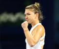 Halep labours to victory on comeback at Prague Open