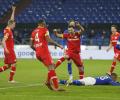 Soccer PIX: Leverkusen thump Schalke; Milan win