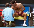 Federer hopes to recover from groin problem after lucky escape