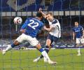 Football: Kane earns Spurs draw at Everton