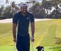 Tiger posts photo of himself on crutches