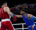 Gutsy Satish Kumar goes down to World champ Jalolov