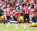 EPL PHOTOS: Saints bring United down to earth; Chelsea down Arsenal