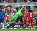 EPL PIX: 10-man Chelsea hold Liverpool; City rout Arsenal