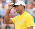 Recovering Tiger Woods in 'good spirits'