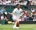 Wimbledon PIX: Djokovic, Barty advance; Jabeur makes history