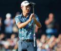 Ice-cool Morikawa wins blazing hot British Open