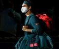 Federer returns after 14 months, no ice bath for champ