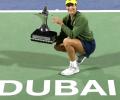 Muguruza relieved to end trophy drought with Dubai win