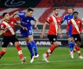 Soccer: Leicester held; Leipzig in German cup final