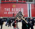 Man United-Liverpool tie postponed as fans storm pitch