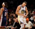 NBA: Stephen Curry hits nine 3s in Warriors' rout of Nets