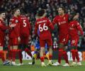 PICS: Liverpool, Arsenal score easy wins