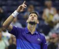 US Open PIX: Djokovic fights back to enter semis; Sakkari, Raducanu advance