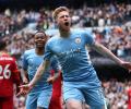 EPL PIX: City, Liverpool share spoils in pulsating tie