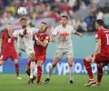 Switzerland move on to last 16 at Serbia's expense