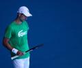 Djokovic included in Australian Open draw as visa decision looms