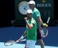 Djokovic practises for Australian Open as he waits for visa ruling