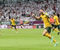 Late deflected strike keeps Australian World Cup hopes alive