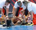 US swimmer saved from drowning by coach