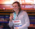 PIX: Ledecky wins 19th gold; butterfly double by Milak