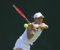 Ukranian Kalinina to rebuild parents' home with Wimbledon earnings