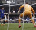 EPL PIX: Chelsea put aside turmoil while Gunners march on