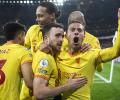 Liverpool beat Arsenal to cut Man City's lead; Spurs win