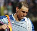 Nadal knocked out; Swiatek wins 25th straight match